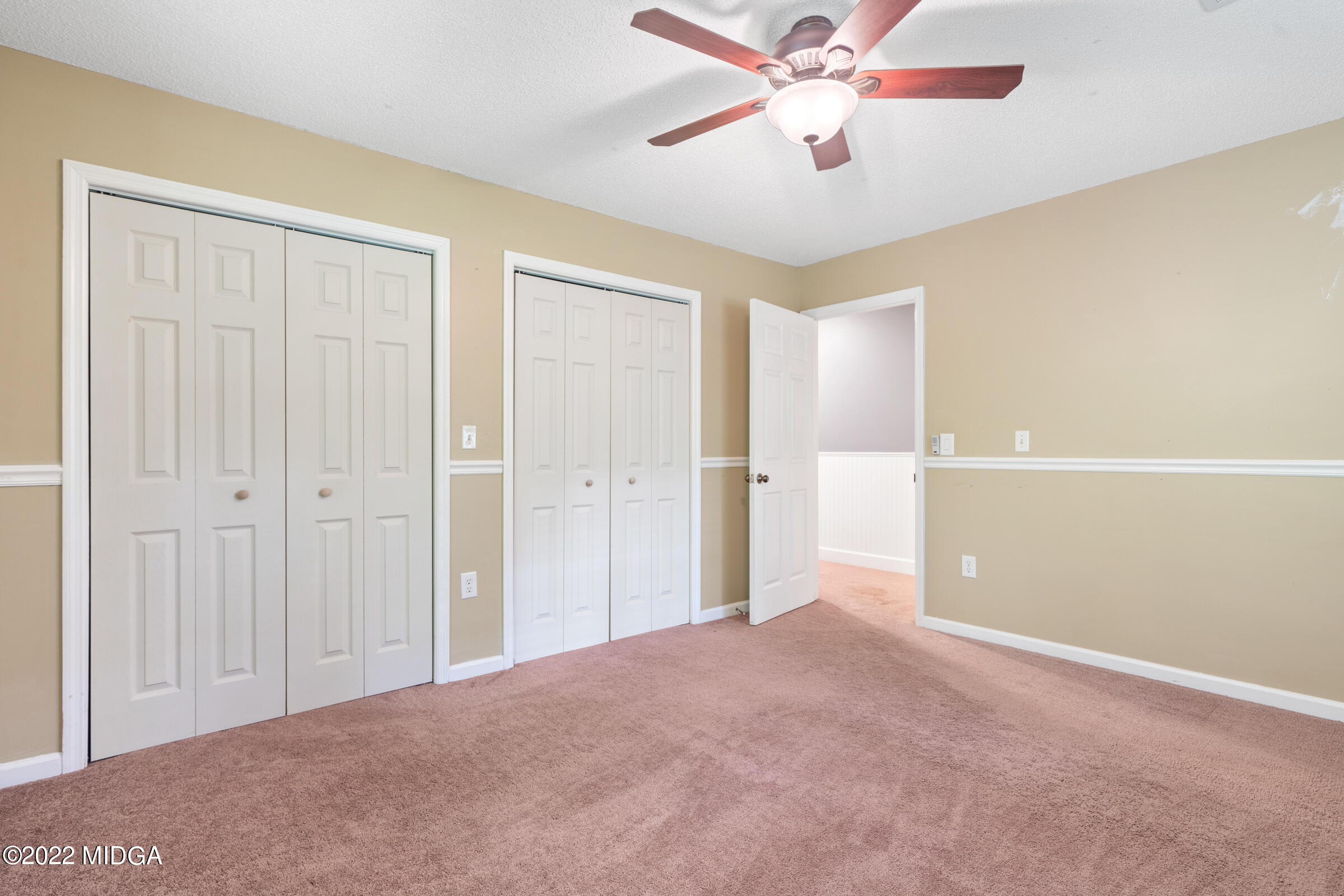 457 Lite-N-Tie Road Gray, GA 31032 - Photo 13 of 30 a view of empty room with a ceiling fan