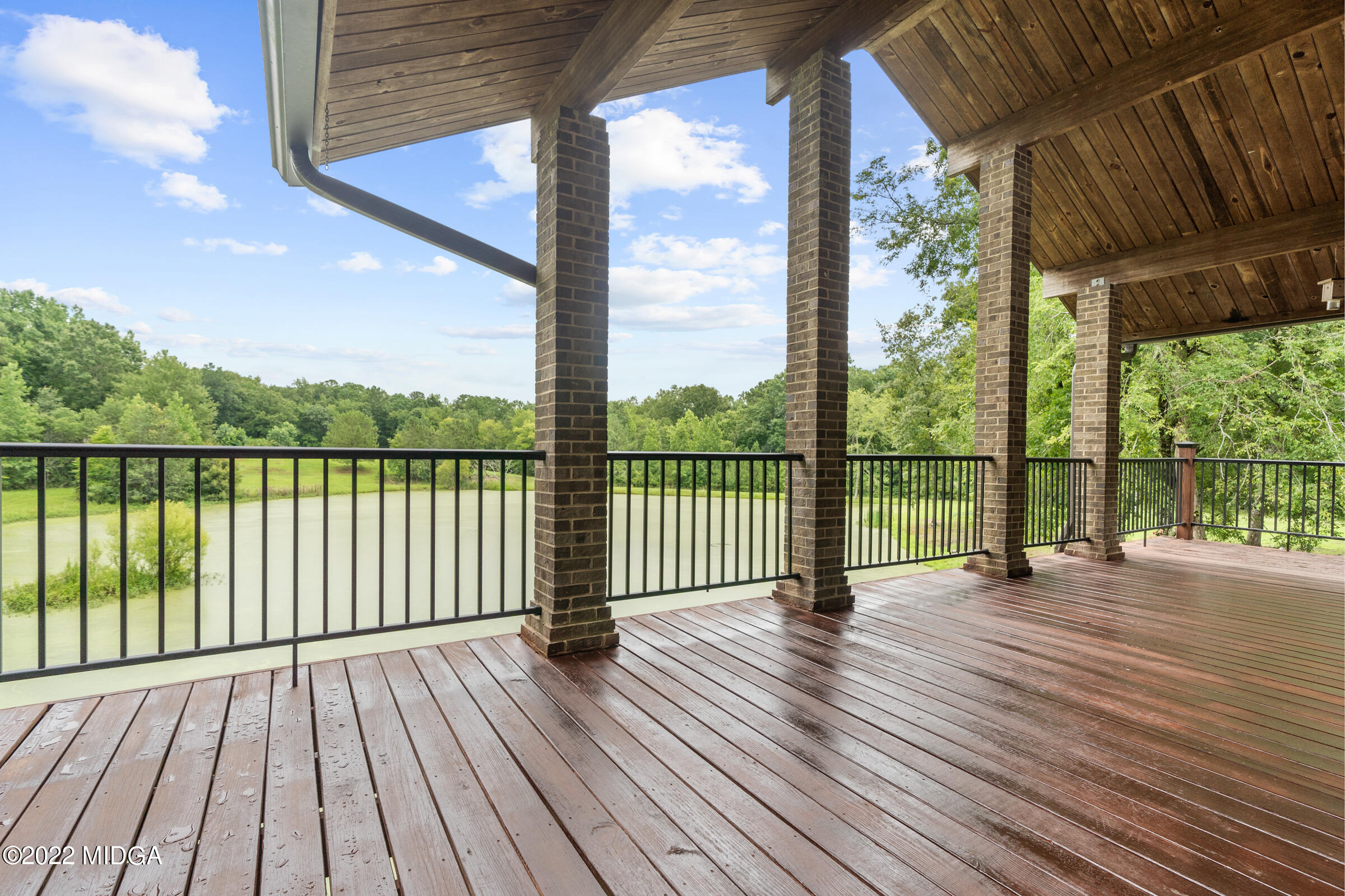 457 Lite-N-Tie Road Gray, GA 31032 - Photo 24 of 30 a view of wooden deck with a yard