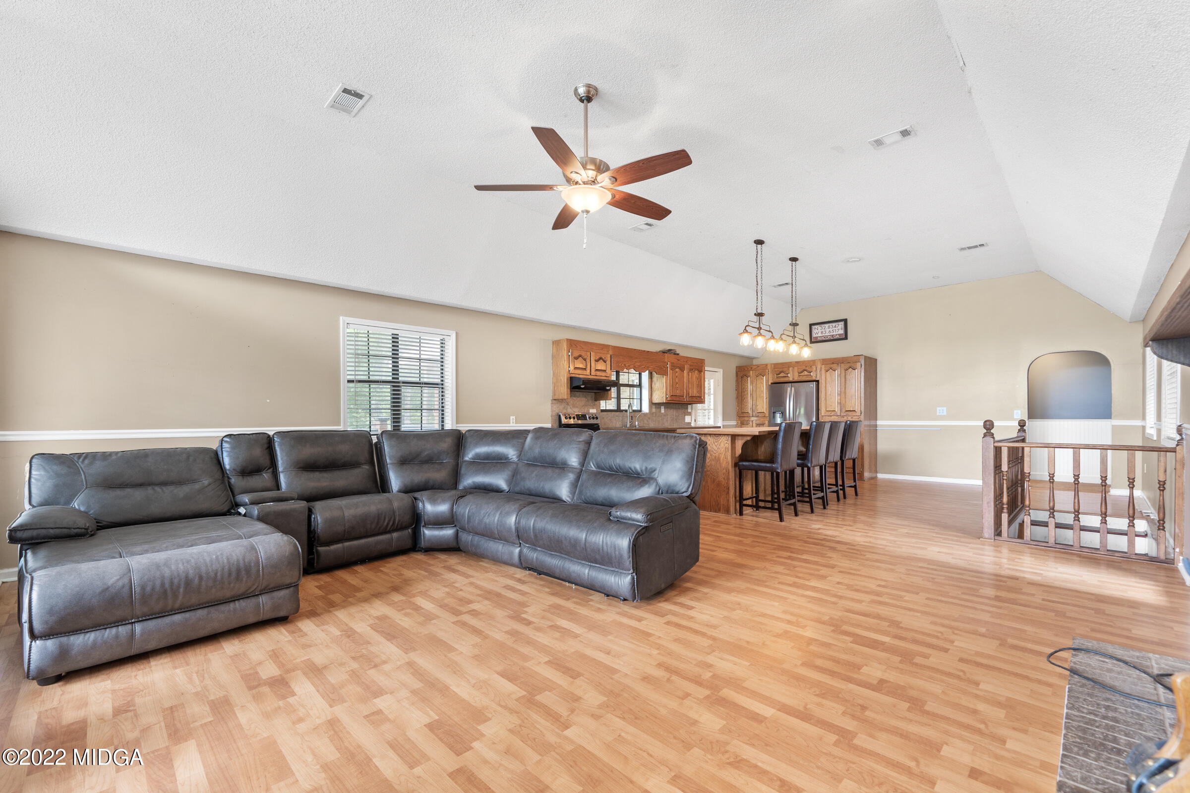 457 Lite-N-Tie Road Gray, GA 31032 - Photo 6 of 30 a living room with furniture and a wooden floor