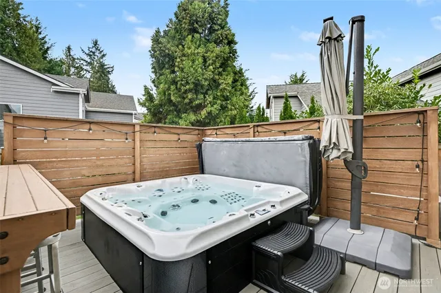 a view of barbeque grill and backyard