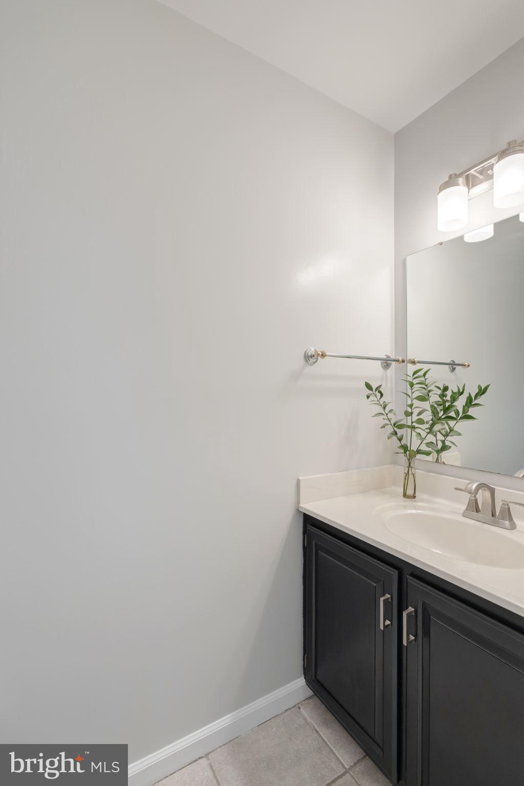 7736 Huntsman Boulevard Springfield, VA 22153 - Photo 29 of 70 Half bath main level