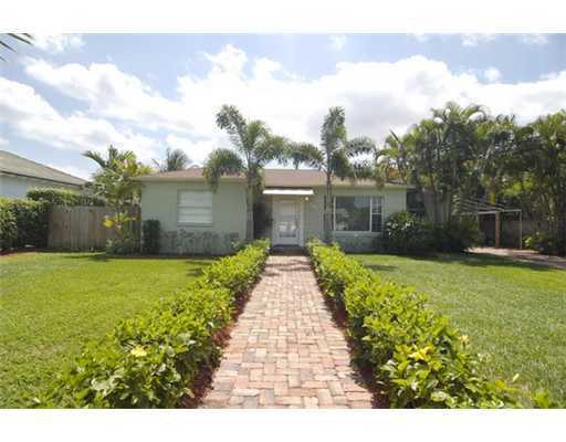 320 Potter Road West Palm Beach, FL 33405 - Photo 1 of 11 a front view of a house with garden