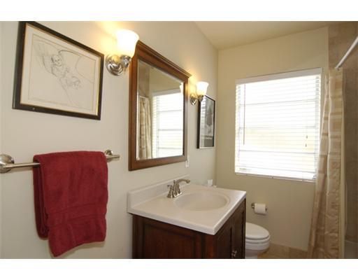 320 Potter Road West Palm Beach, FL 33405 - Photo 7 of 11 a bathroom with a sink and a mirror
