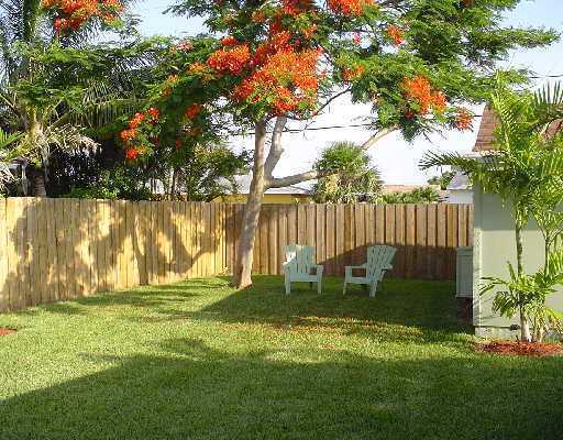 320 Potter Road West Palm Beach, FL 33405 - Photo 10 of 11 a view of garden with wooden fence