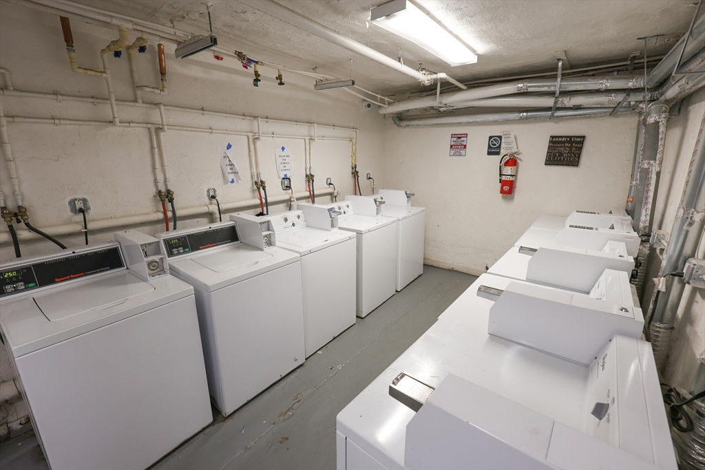 100 Seaver Street, Unit 2 Boston, MA 02121 - Photo 17 of 18 a utility room with dryer and washer