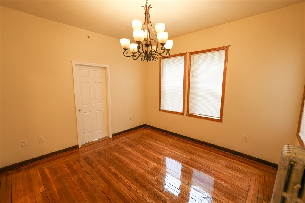 100 Seaver Street, Unit 2 Boston, MA 02121 - Photo 7 of 18 a view of an empty room with a window