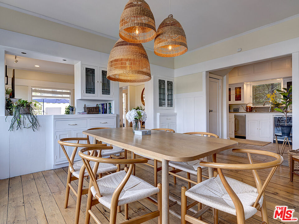 111 Dudley Avenue Venice, CA 90291 - Photo 11 of 33 a view of a dining room with furniture and wooden floor