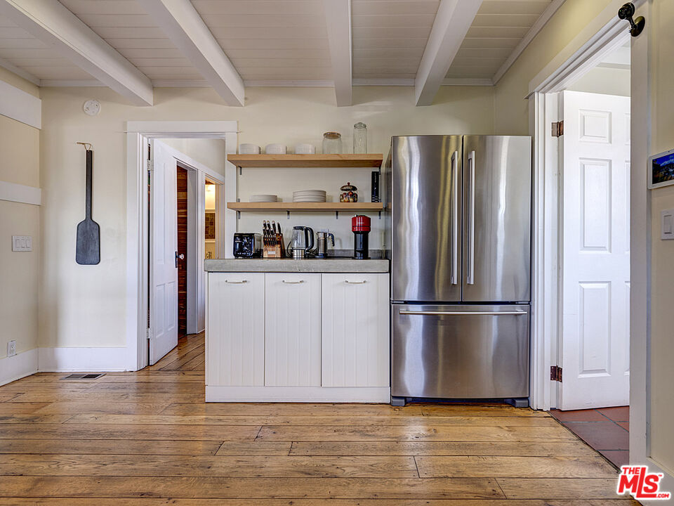 111 Dudley Avenue Venice, CA 90291 - Photo 15 of 33 a kitchen with stainless steel appliances a refrigerator and cabinets
