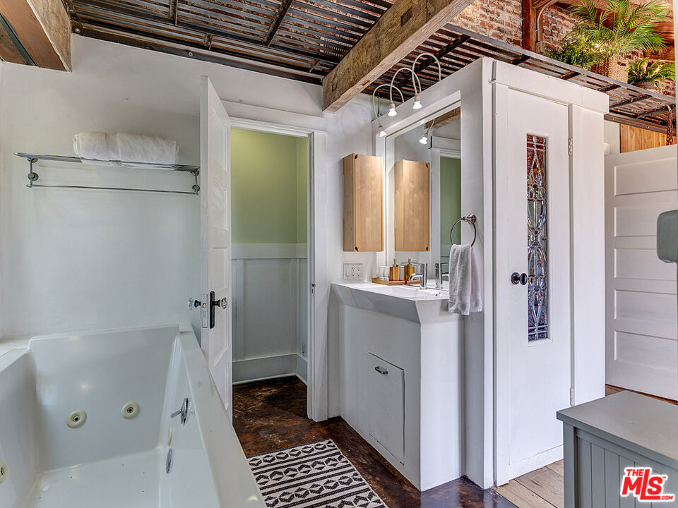 111 Dudley Avenue Venice, CA 90291 - Photo 22 of 33 a bathroom with a shower and a sink