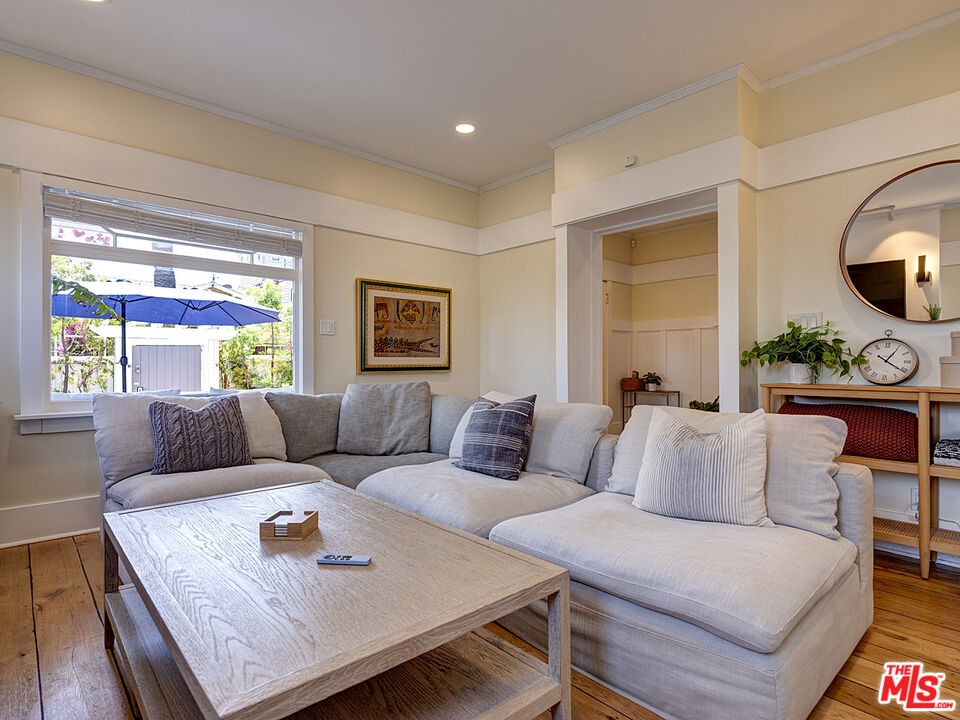 111 Dudley Avenue Venice, CA 90291 - Photo 8 of 33 a living room with furniture and a large window