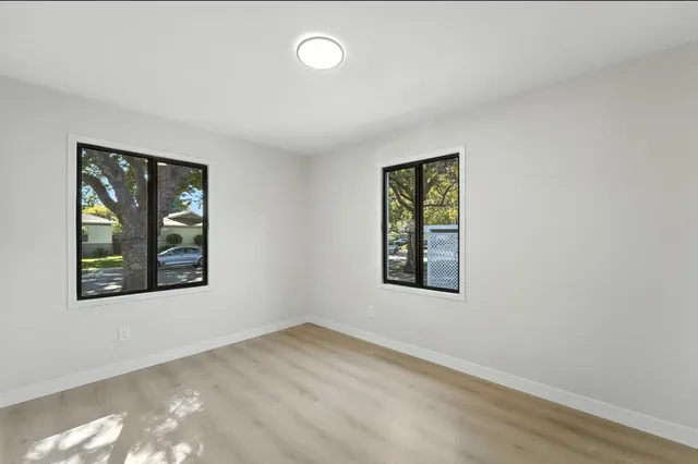 an empty room with windows