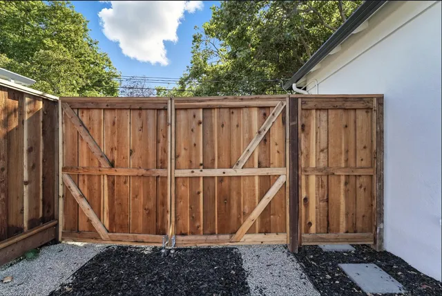 a view of a wooden fence