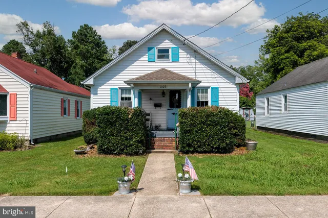 a house view with a garden space