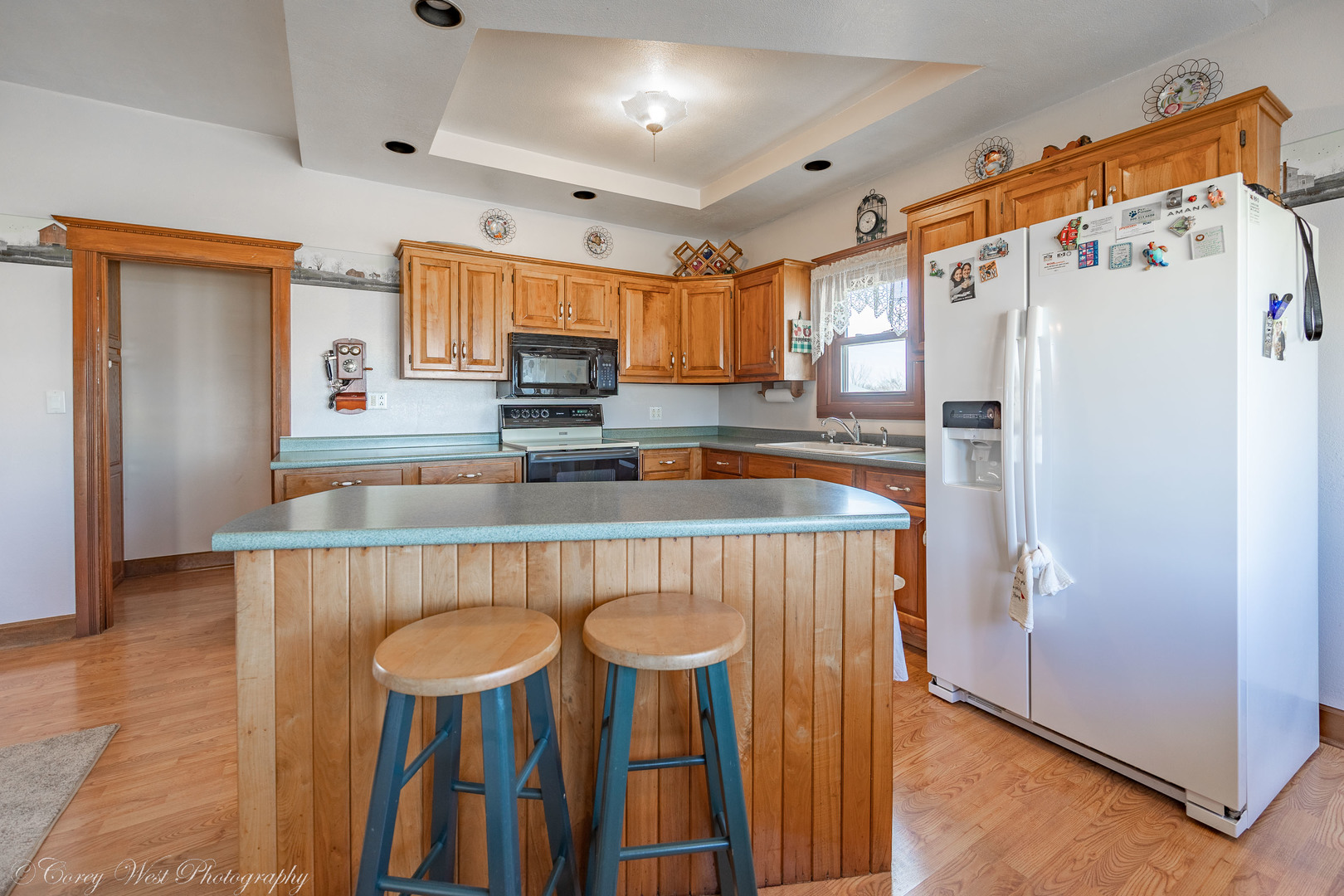 1137 Fisk Road Compton, IL 61318 - Photo 25 of 50 a kitchen with granite countertop a refrigerator and a stove top oven