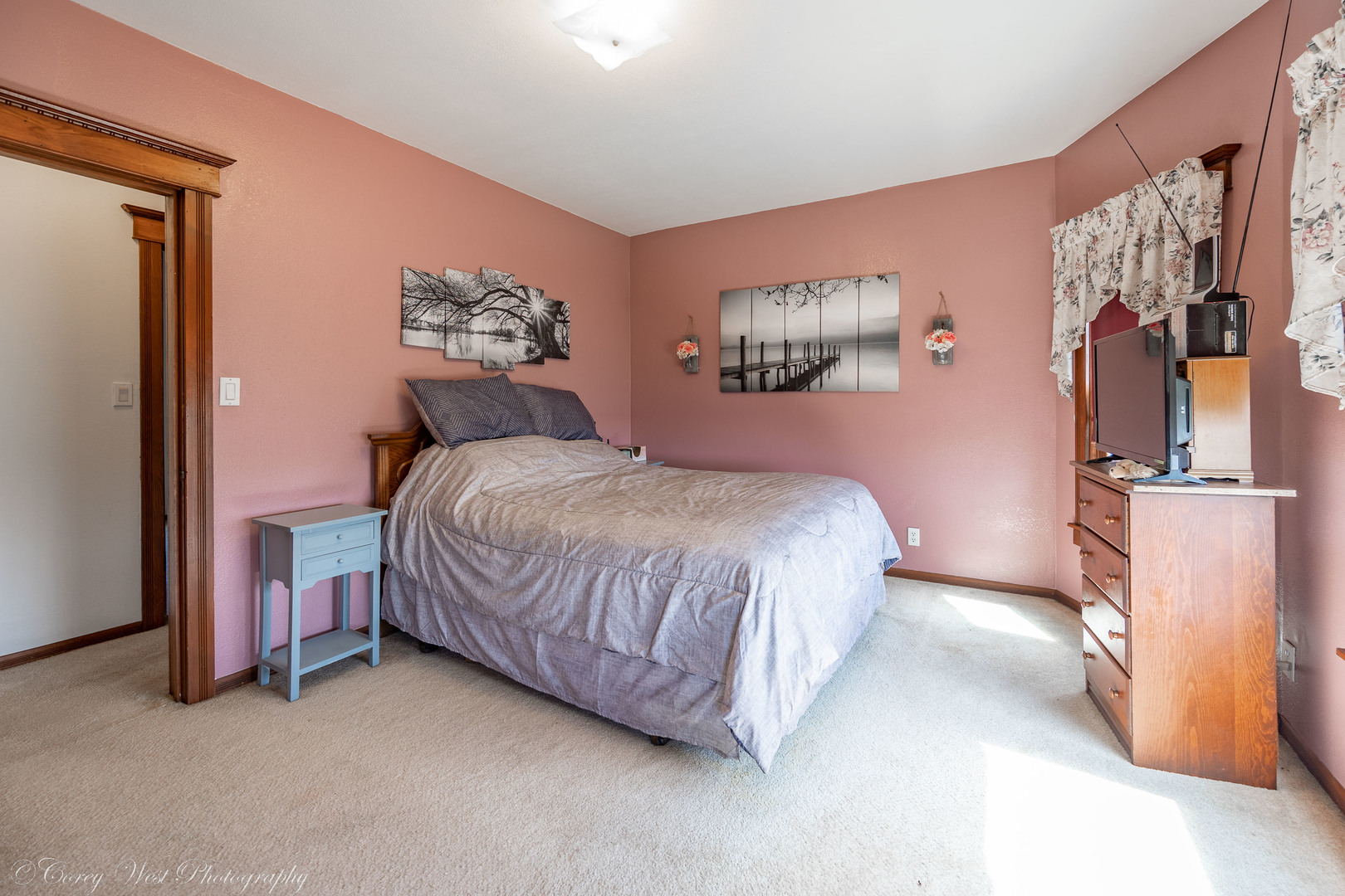 1137 Fisk Road Compton, IL 61318 - Photo 37 of 50 a bedroom with a bed and a painting on the wall