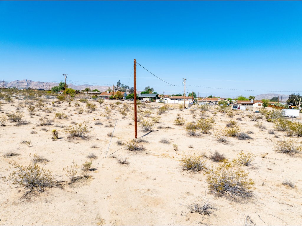 6378 Canyon Road Twentynine Palms, CA 92277 - Photo 12 of 17 a view of a beach with a yard