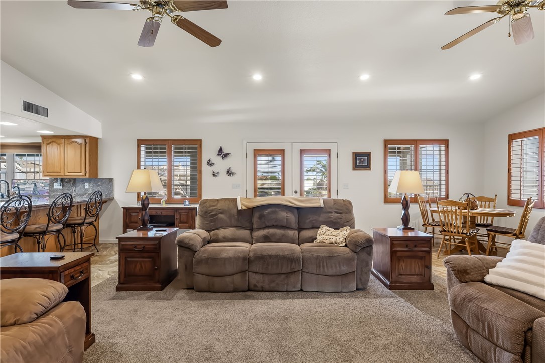 3342 Park Ridge Avenue Bullhead City, AZ 86429 - Photo 39 of 93 Spacious open-concept living area featuring recessed lighting, ceiling fans, and carpeted flooring