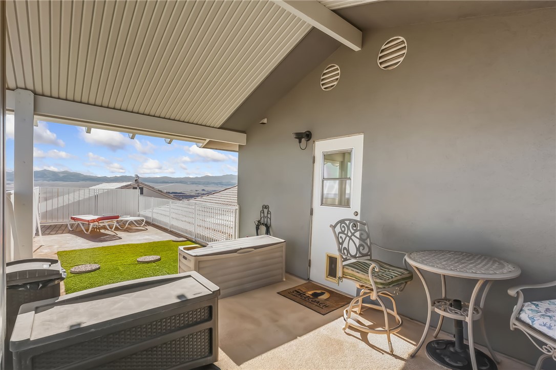 3342 Park Ridge Avenue Bullhead City, AZ 86429 - Photo 58 of 93 The property features a covered patio area with a view of a body of water and distant land formations