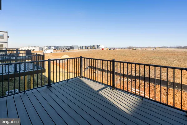 a view of wooden balcony with city view