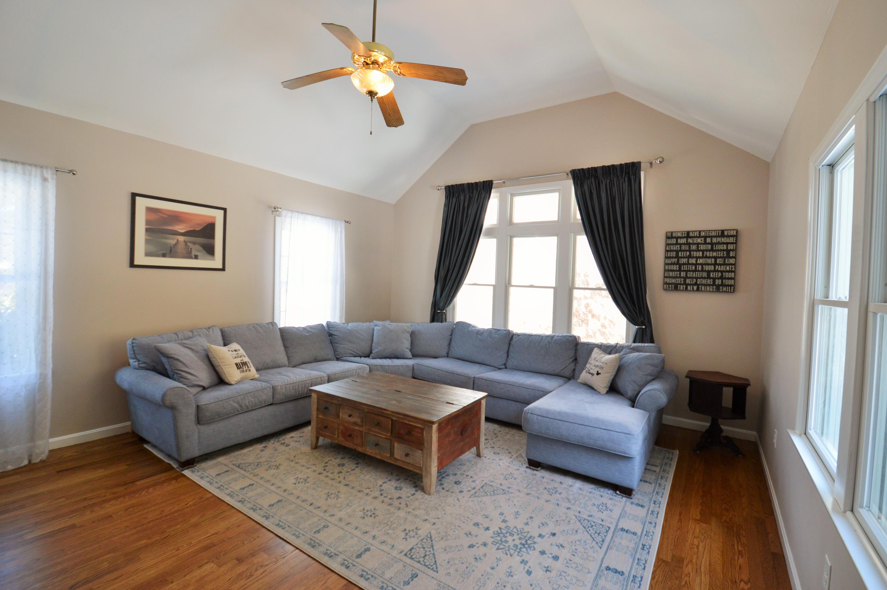 24 Braley Jenkins Road Centerville, MA 02632 - Photo 8 of 20 a living room with furniture and a large window