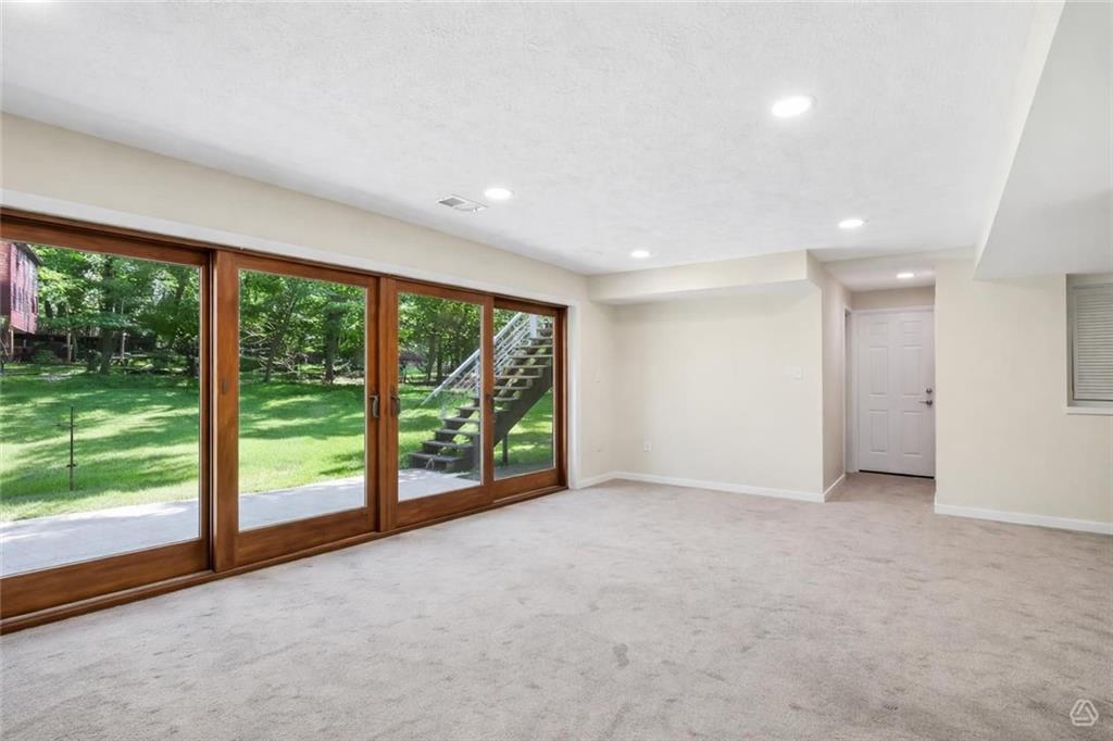 2772 Clearview Road Allison Park, PA 15101 - Photo 29 of 43 a view of an empty room with wooden floor and garden