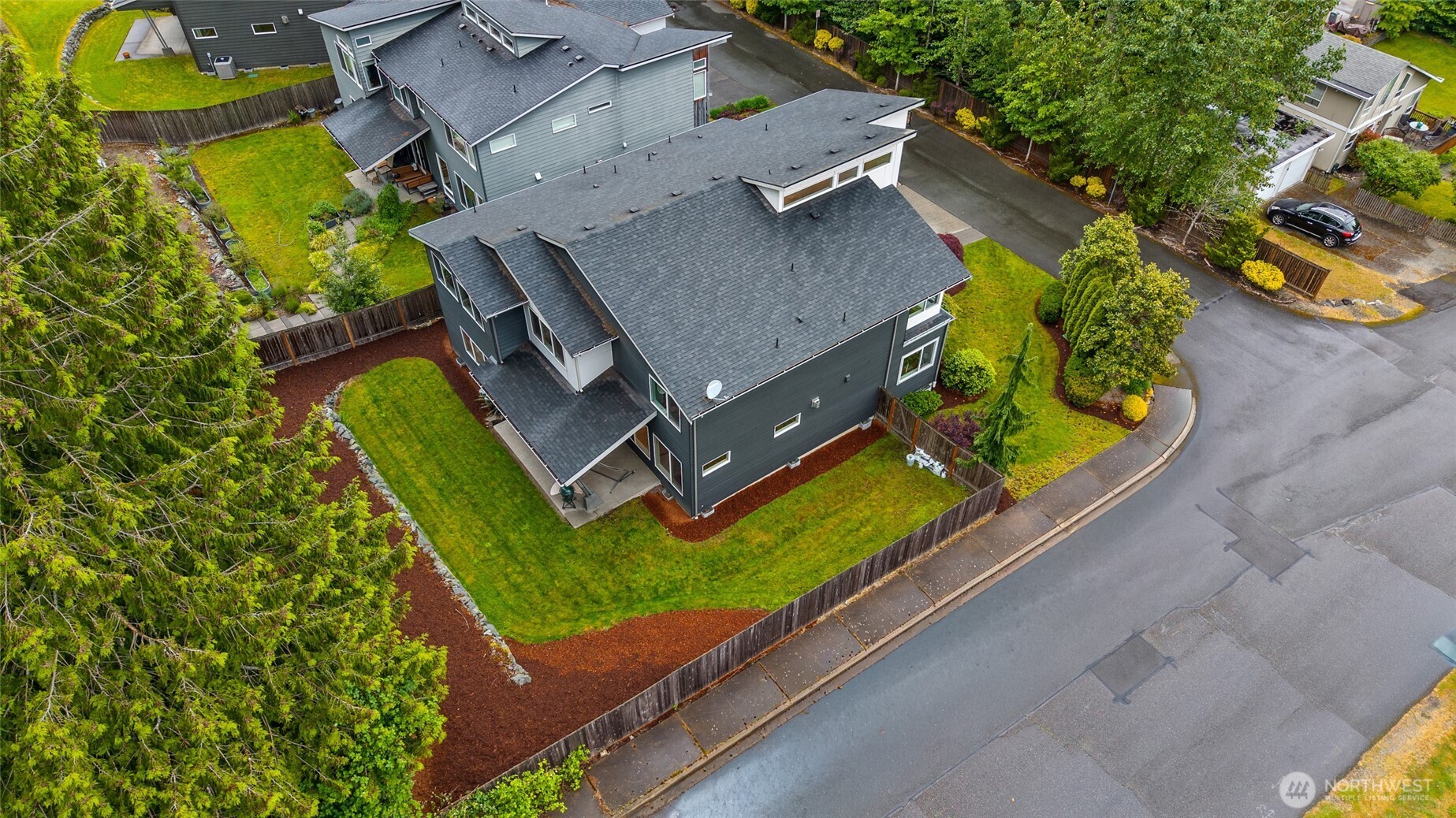 22326 2nd Place Southeast Bothell, WA 98021 - Photo 39 of 40 an aerial view of a house with a garden and swimming pool