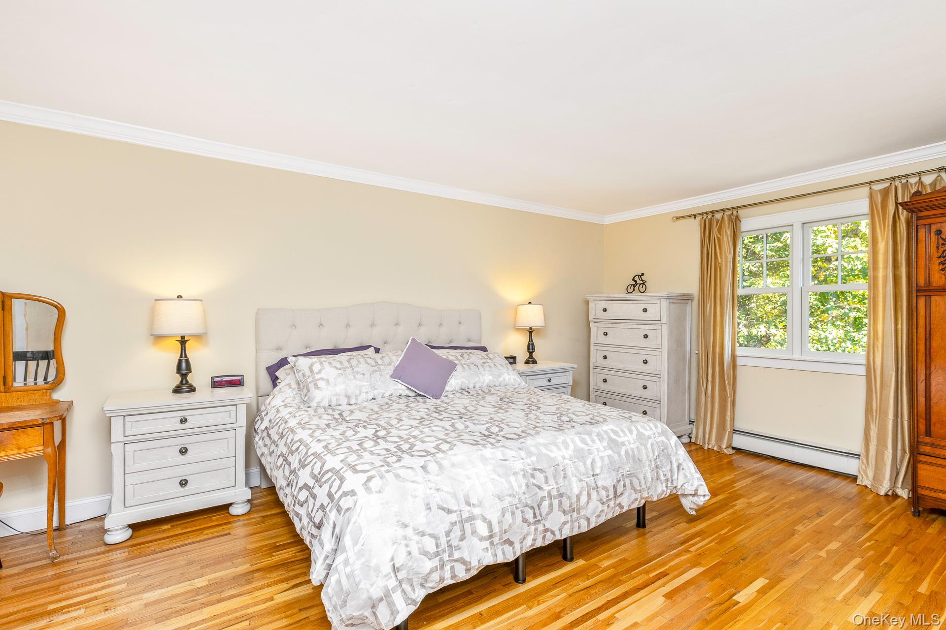 7 Shipyard Lane Setauket, NY 11733 - Photo 24 of 32 a bedroom with a bed and a closet