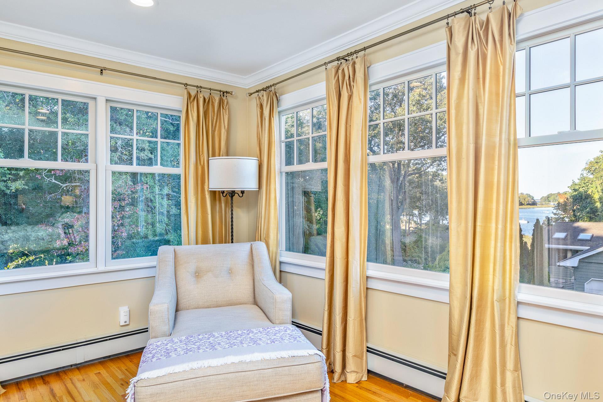 7 Shipyard Lane Setauket, NY 11733 - Photo 26 of 32 a living room with a large window