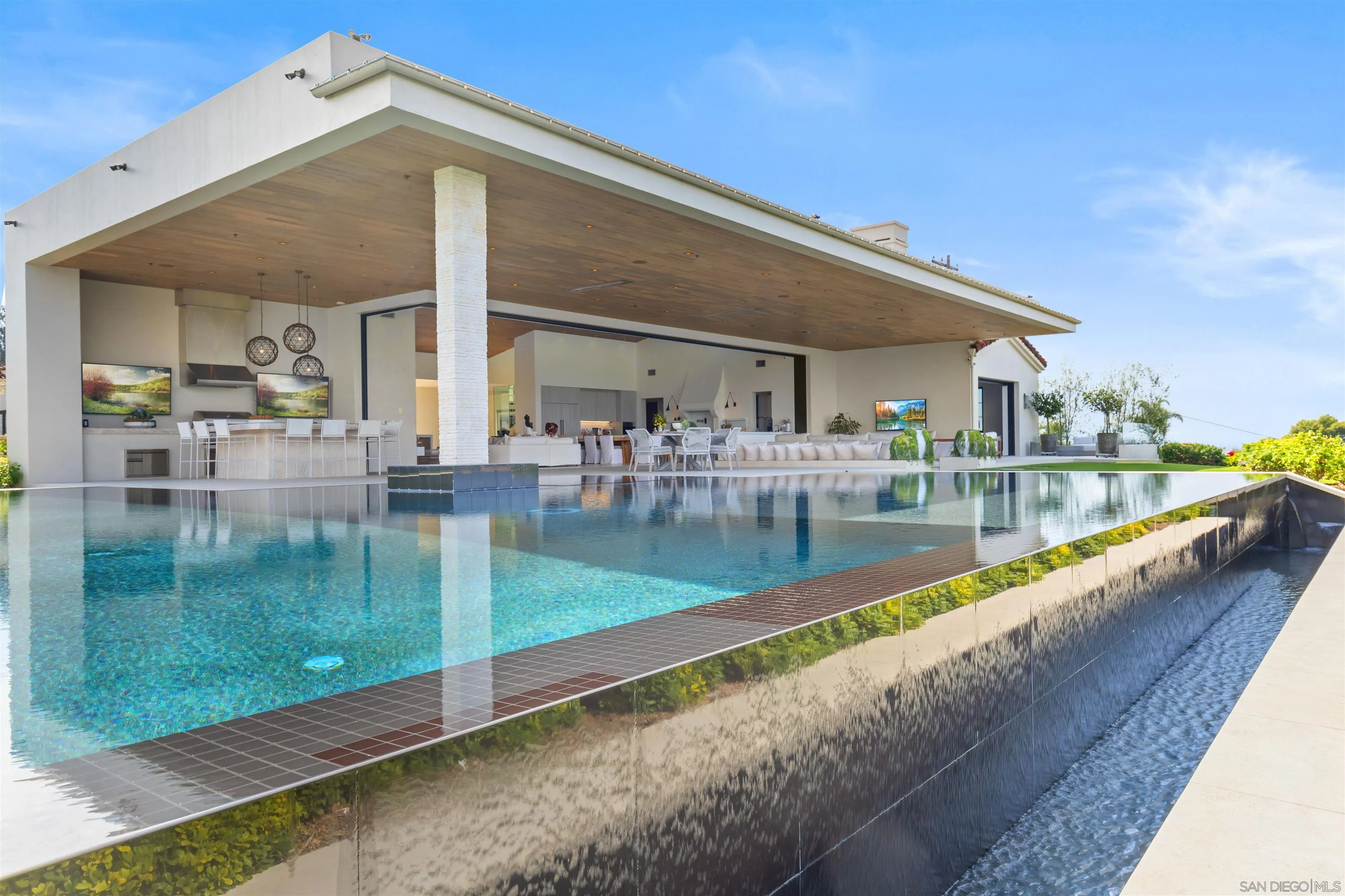 5516 La Crescenta Road Rancho Santa Fe, CA 92067 - Photo 32 of 49 a view of swimming pool with outdoor seating