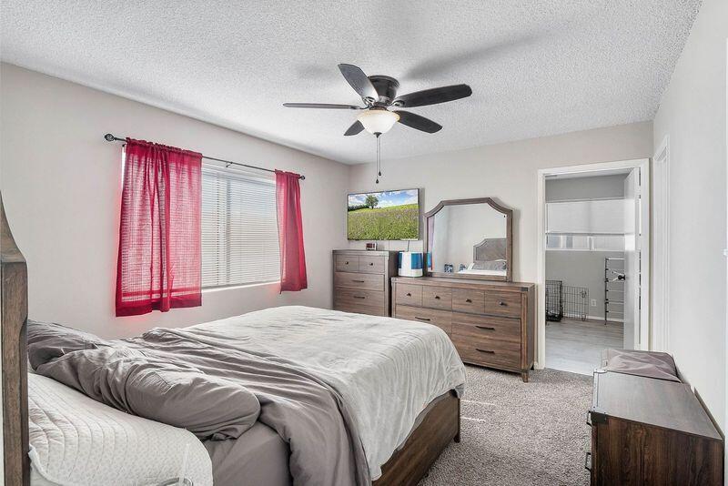 1833 Jenner Street Lancaster, CA 93534 - Photo 17 of 31 a bedroom with a bed and a dresser