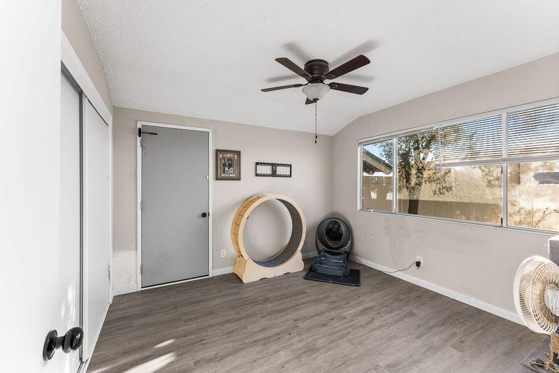 1833 Jenner Street Lancaster, CA 93534 - Photo 24 of 31 a view of a livingroom with furniture wooden floor and window