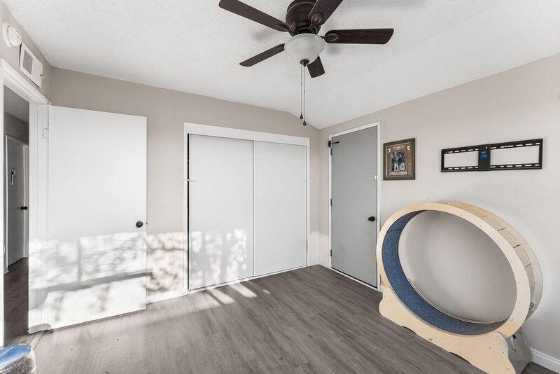 1833 Jenner Street Lancaster, CA 93534 - Photo 25 of 31 a view of empty room with wooden floor and fan