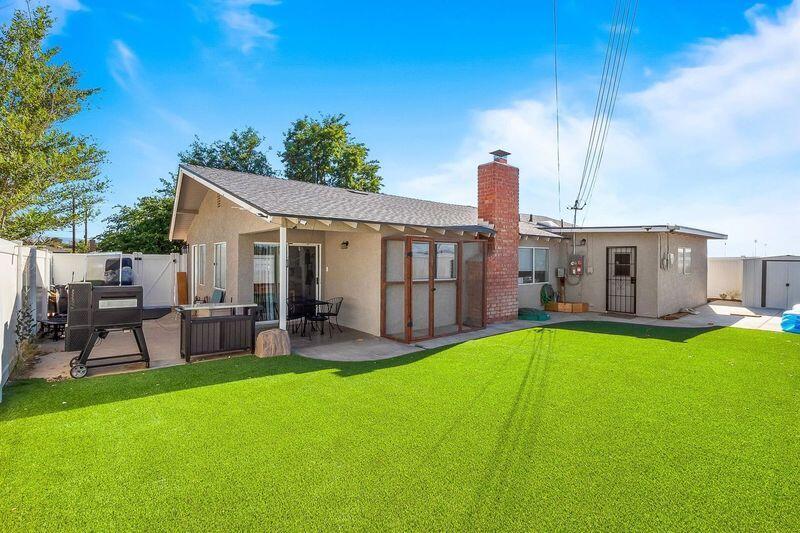 1833 Jenner Street Lancaster, CA 93534 - Photo 28 of 31 a view of a house with a yard and sitting area