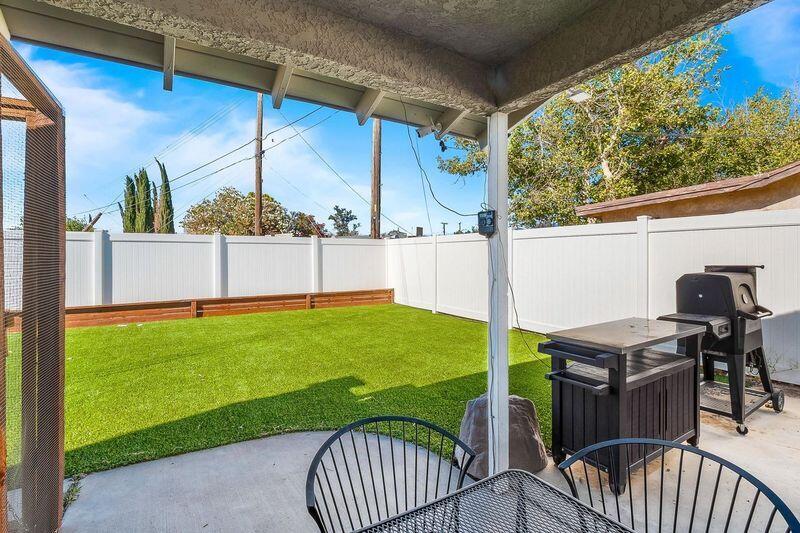 1833 Jenner Street Lancaster, CA 93534 - Photo 29 of 31 a view of a porch with furniture and garden