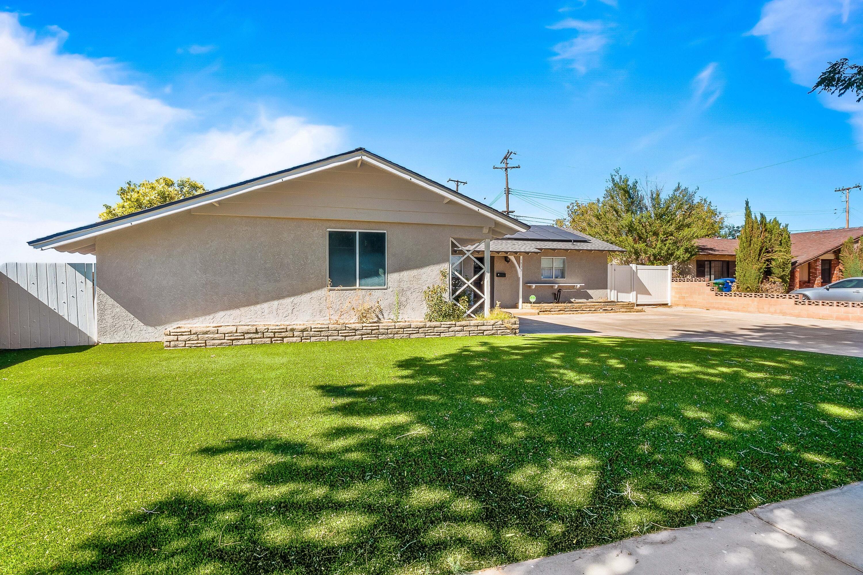 1833 Jenner Street Lancaster, CA 93534 - Photo 3 of 31 a front view of a house with garden
