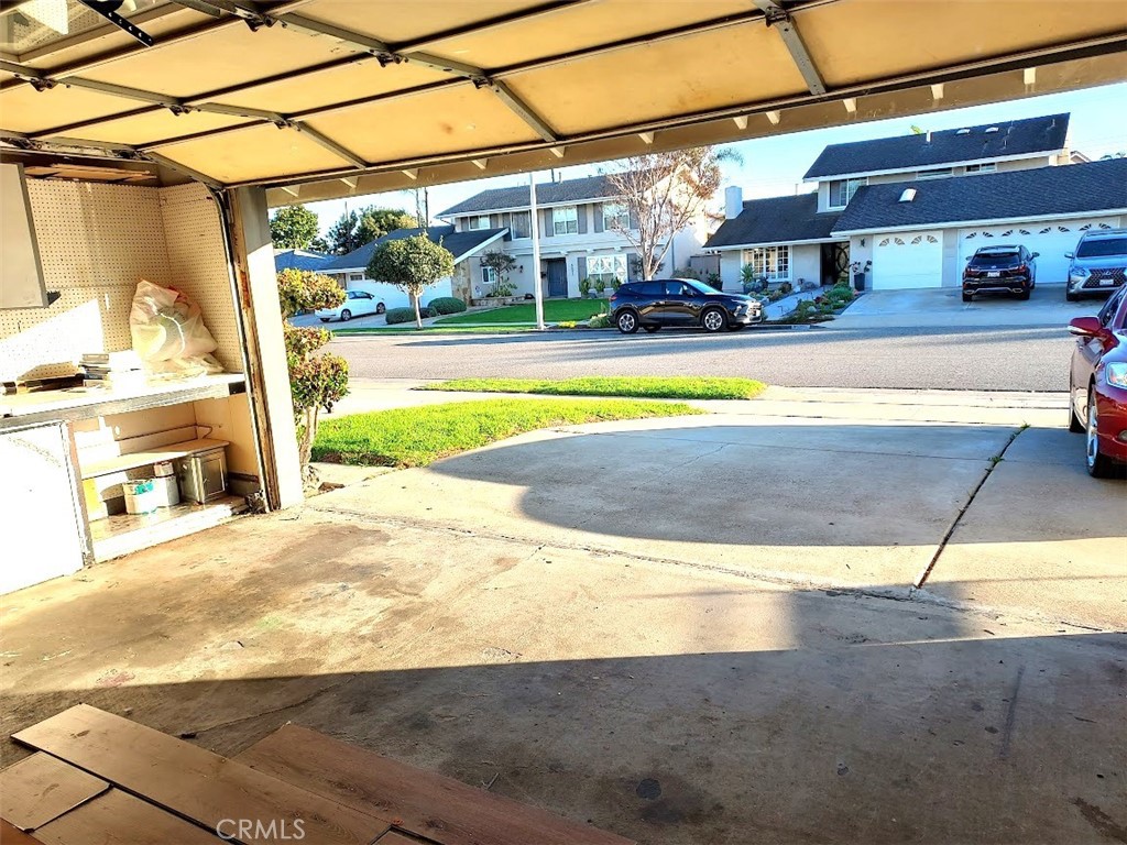 8803 Hummingbird Avenue Fountain Valley, CA 92708 - Photo 35 of 43 a view of a building with a swimming pool