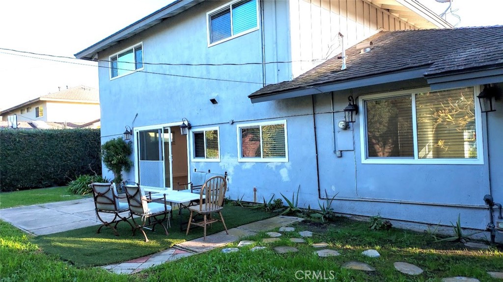 8803 Hummingbird Avenue Fountain Valley, CA 92708 - Photo 41 of 43 a front view of house with yard and outdoor seating