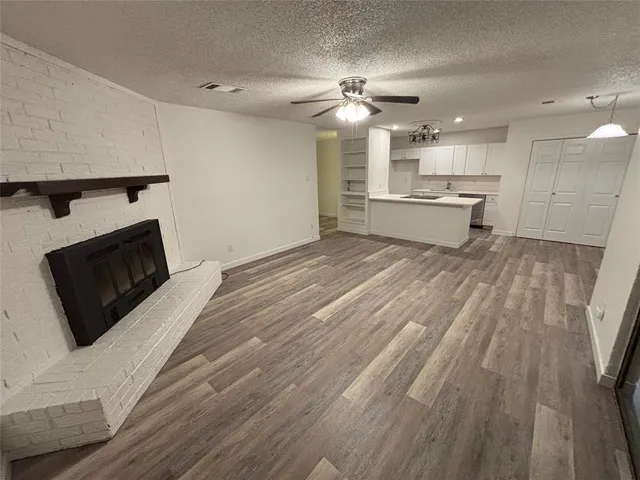 a kitchen with a sink a stove and refrigerator