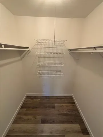 a view of a room with racks on the wall