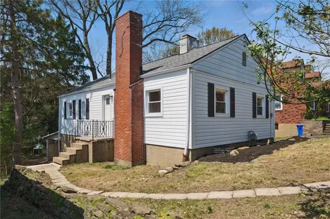 a sign that is on the side of the road