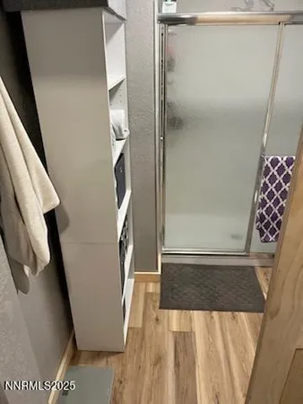 a bathroom with a sink mirror and toilet