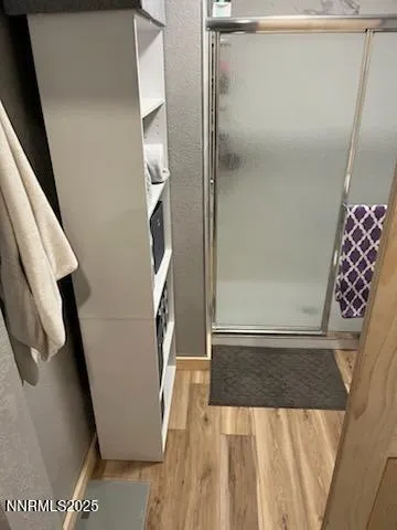 a bathroom with a sink mirror and toilet
