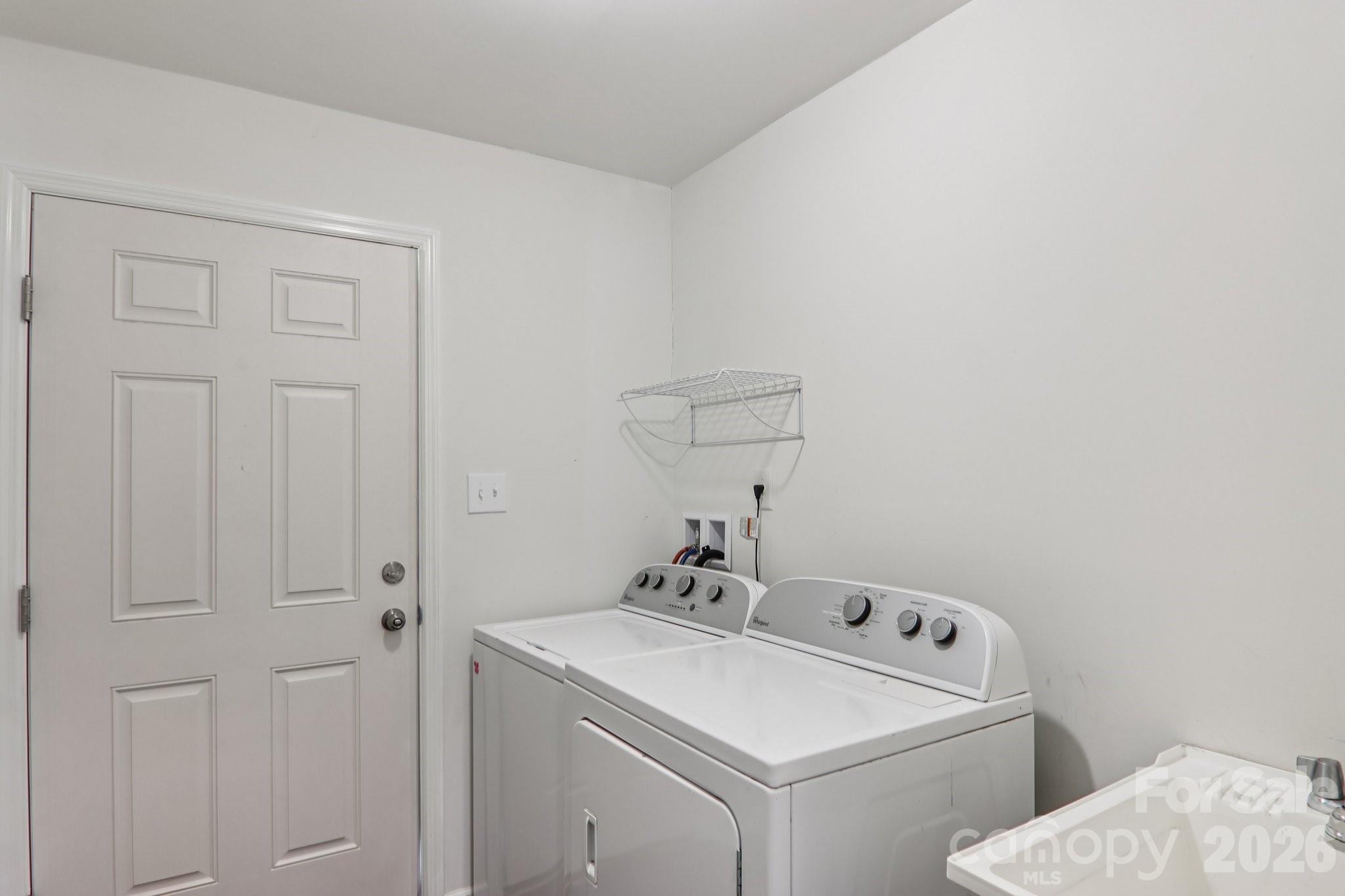 751 Hutch Mountain Road Fletcher, NC 28732 - Photo 26 of 48 a bathroom with a sink and a toilet