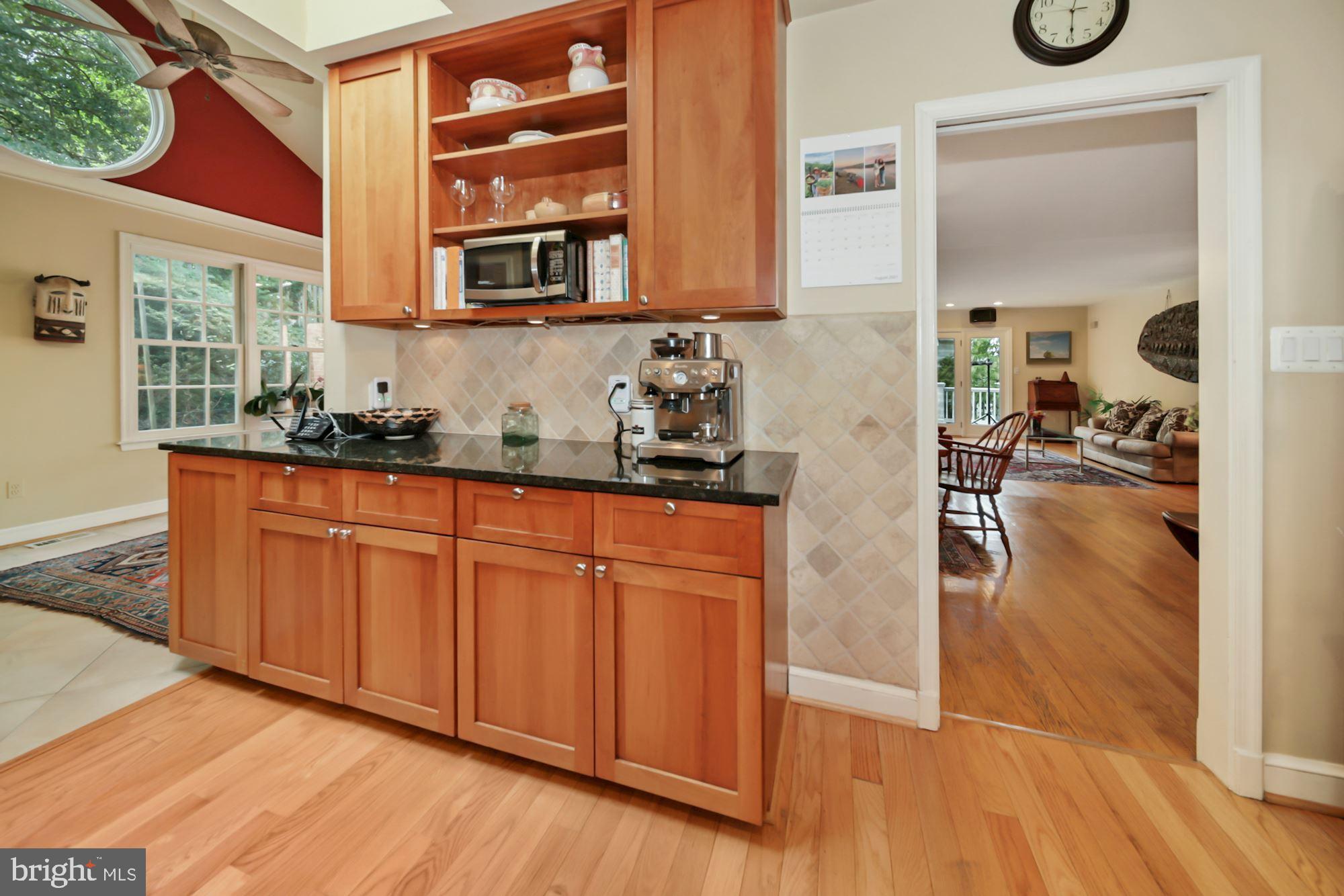 6002 Winnebago Road Bethesda, MD 20816 - Photo 9 of 54 Cherry cabinets and granite counters