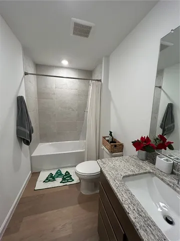 a view of a livingroom with a flat screen tv