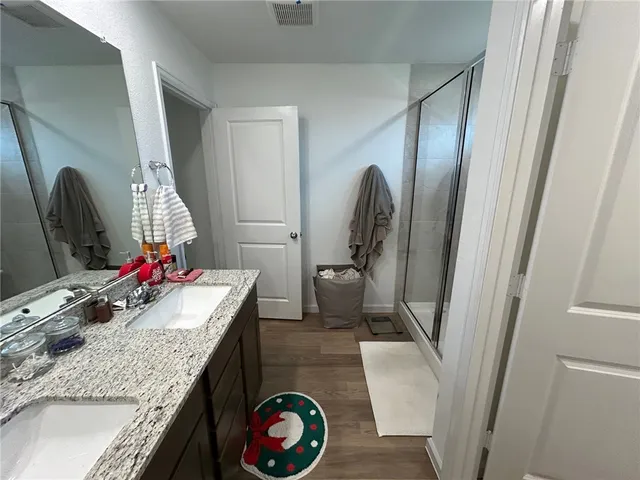 a bedroom with bed and window