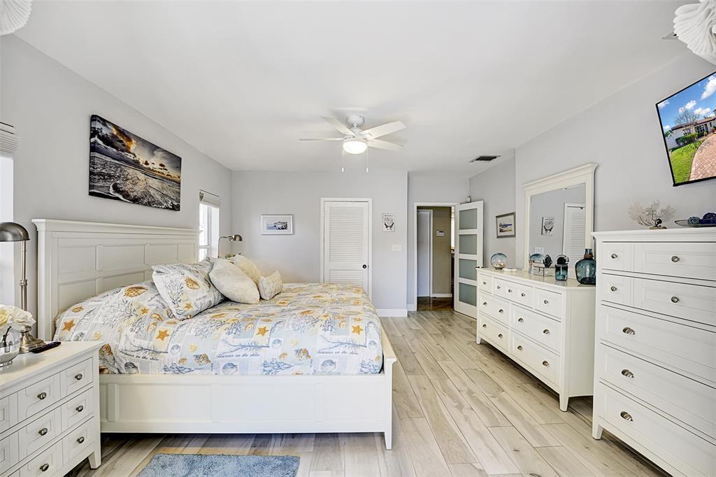 2524 Southeast 9th Street Pompano Beach, FL 33062 - Photo 13 of 45 a living room with furniture and a dresser