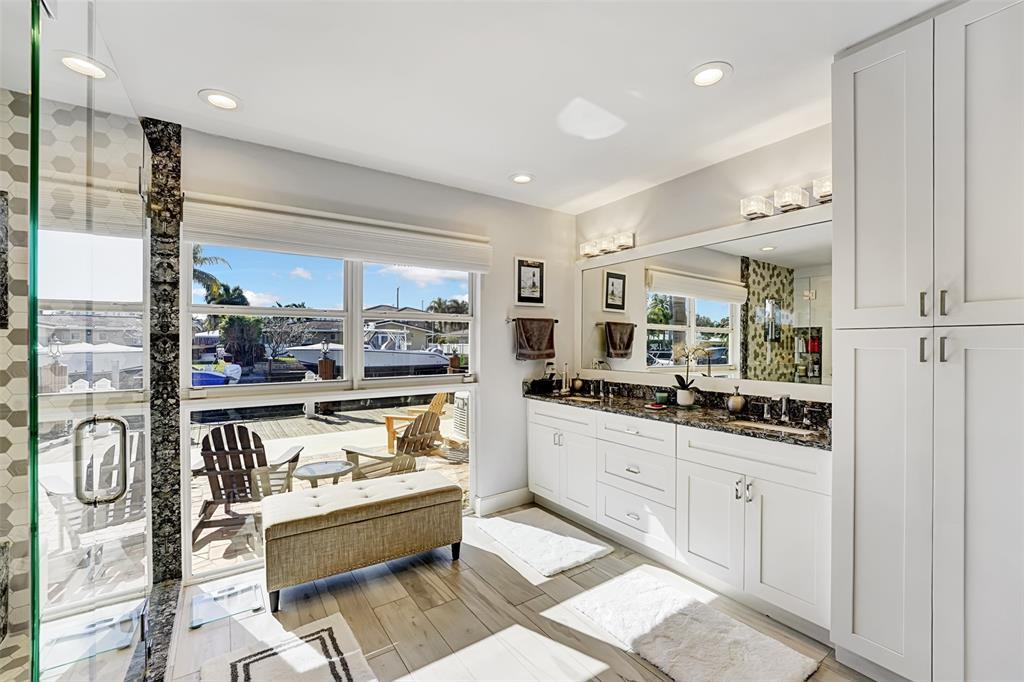 2524 Southeast 9th Street Pompano Beach, FL 33062 - Photo 16 of 45 a room with stainless steel appliances kitchen island granite countertop a sink and cabinets