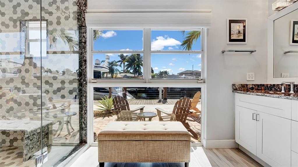 2524 Southeast 9th Street Pompano Beach, FL 33062 - Photo 24 of 45 a view of living room with furniture and flat screen tv