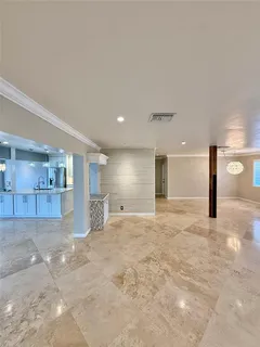 a view of empty room with a empty room